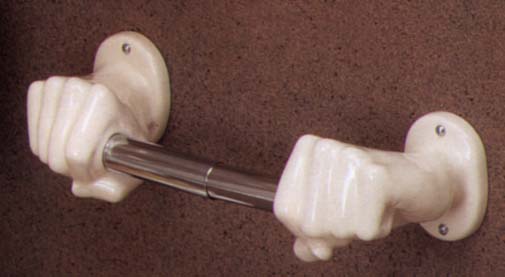 two hands hold a roll of paper on a spring loaded bar